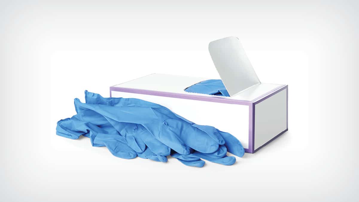 Box of disposable gloves: Several blue gloves spilling out from an open box on a plain background.